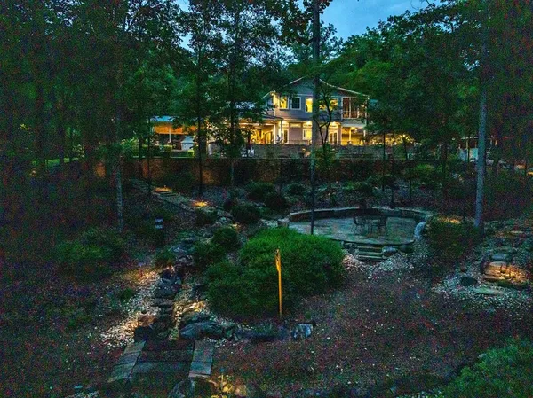 a front view of house with yard and outdoor seating