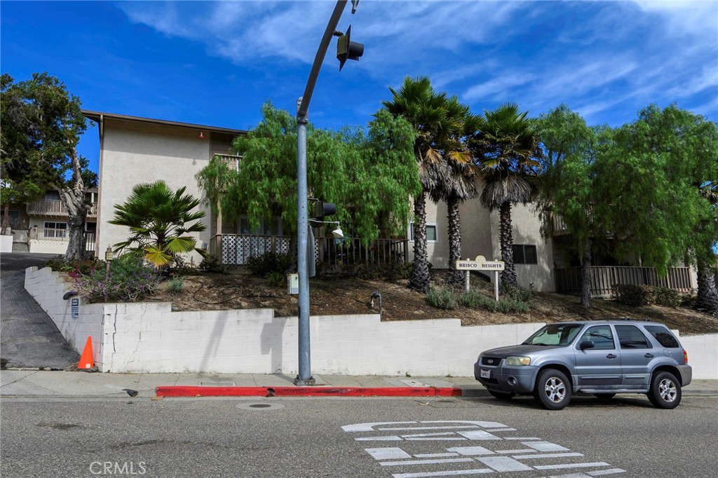 171 Brisco Road, Unit 8 Arroyo Grande, CA 93420 - Photo 21 of 23 a view of cars parked on the side of a street