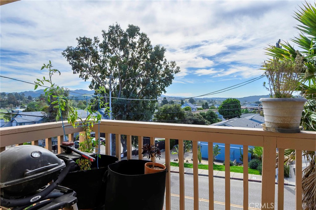 171 Brisco Road, Unit 8 Arroyo Grande, CA 93420 - Photo 7 of 23 a view of a balcony with chairs and a potted plant