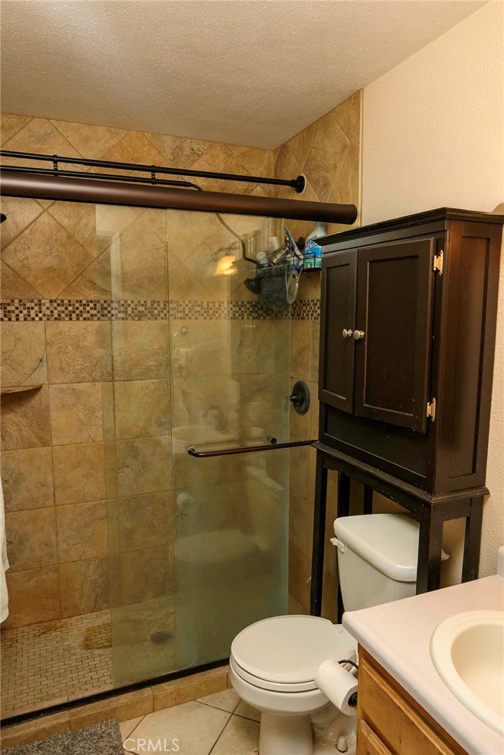 171 Brisco Road, Unit 8 Arroyo Grande, CA 93420 - Photo 8 of 23 a bathroom with a toilet and a shower