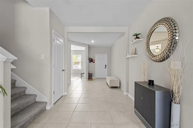 a view of a hallway with seating area