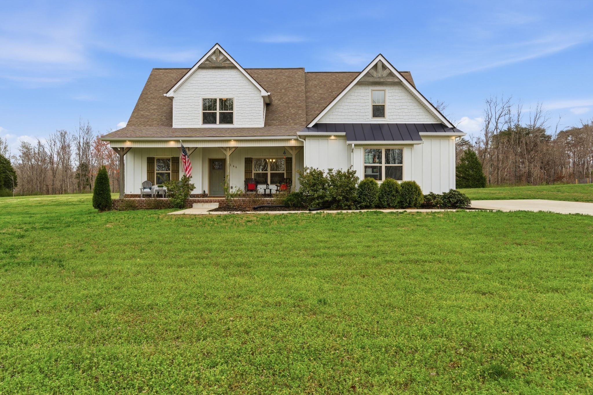 1166 Carney Winters Road Ashland City, TN 37015 - Photo 1 of 41 a front view of a house with a yard