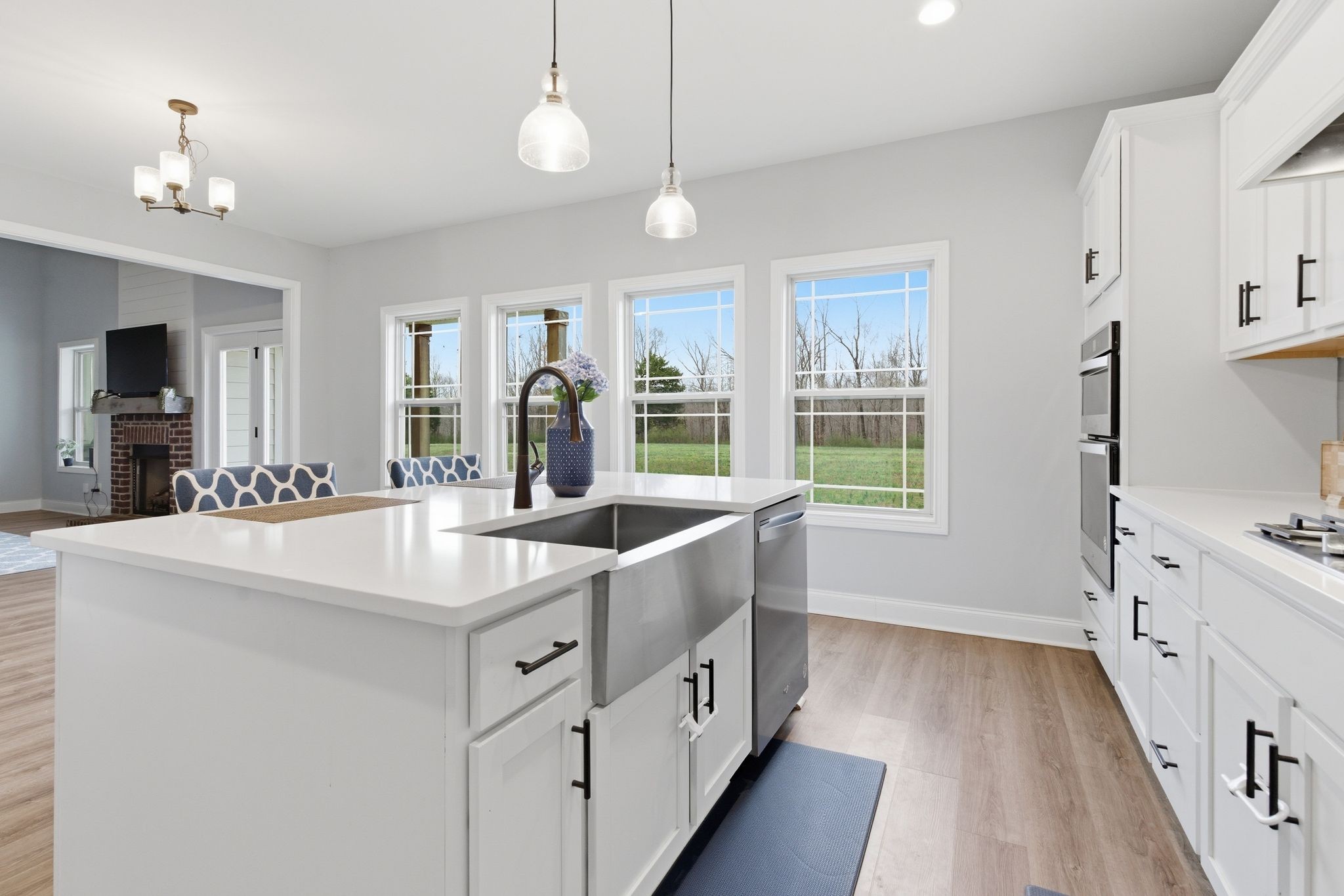 1166 Carney Winters Road Ashland City, TN 37015 - Photo 12 of 41 a large white kitchen with a large window