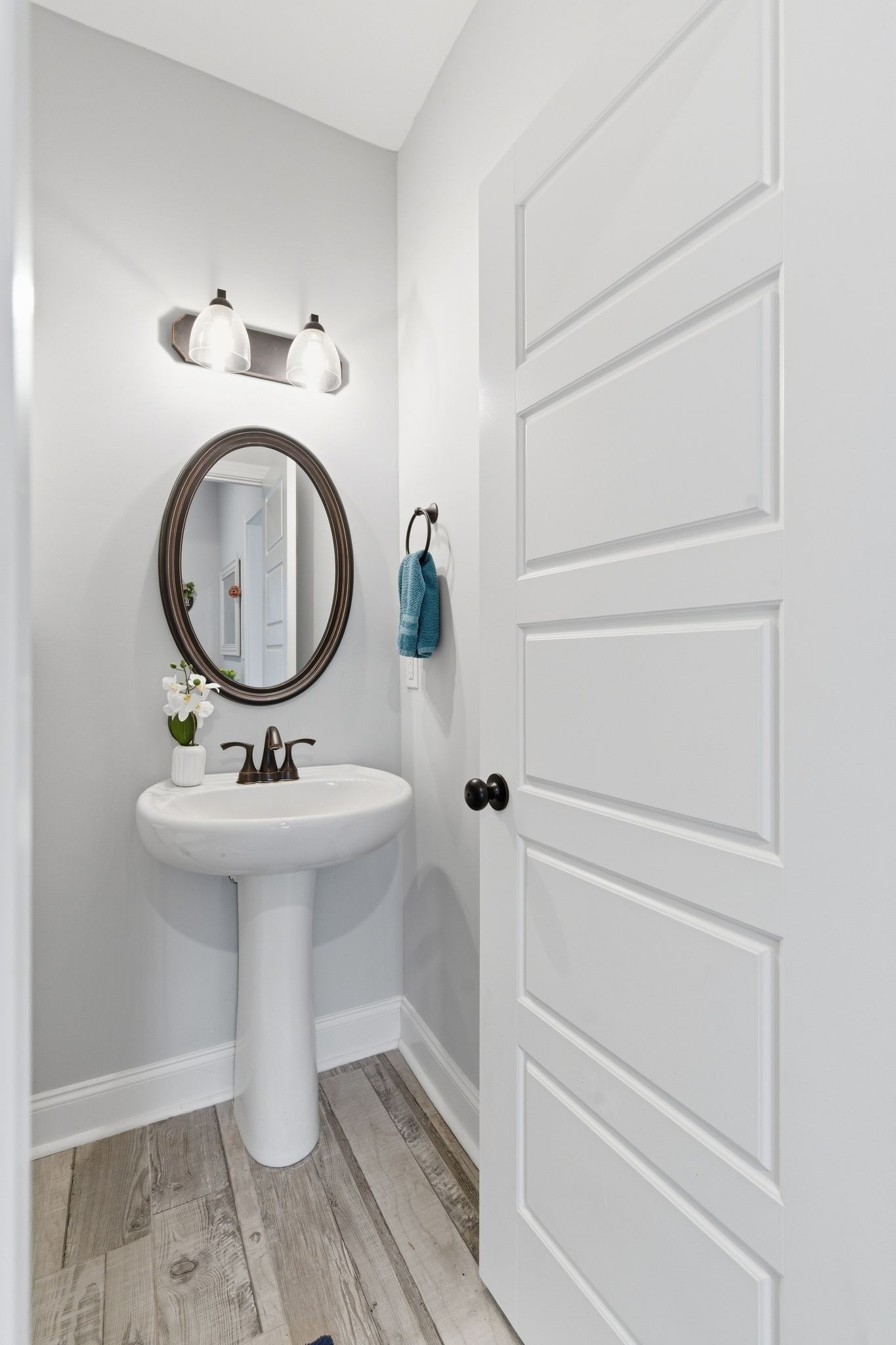 1166 Carney Winters Road Ashland City, TN 37015 - Photo 14 of 41 a bathroom with a sink a mirror and toilet