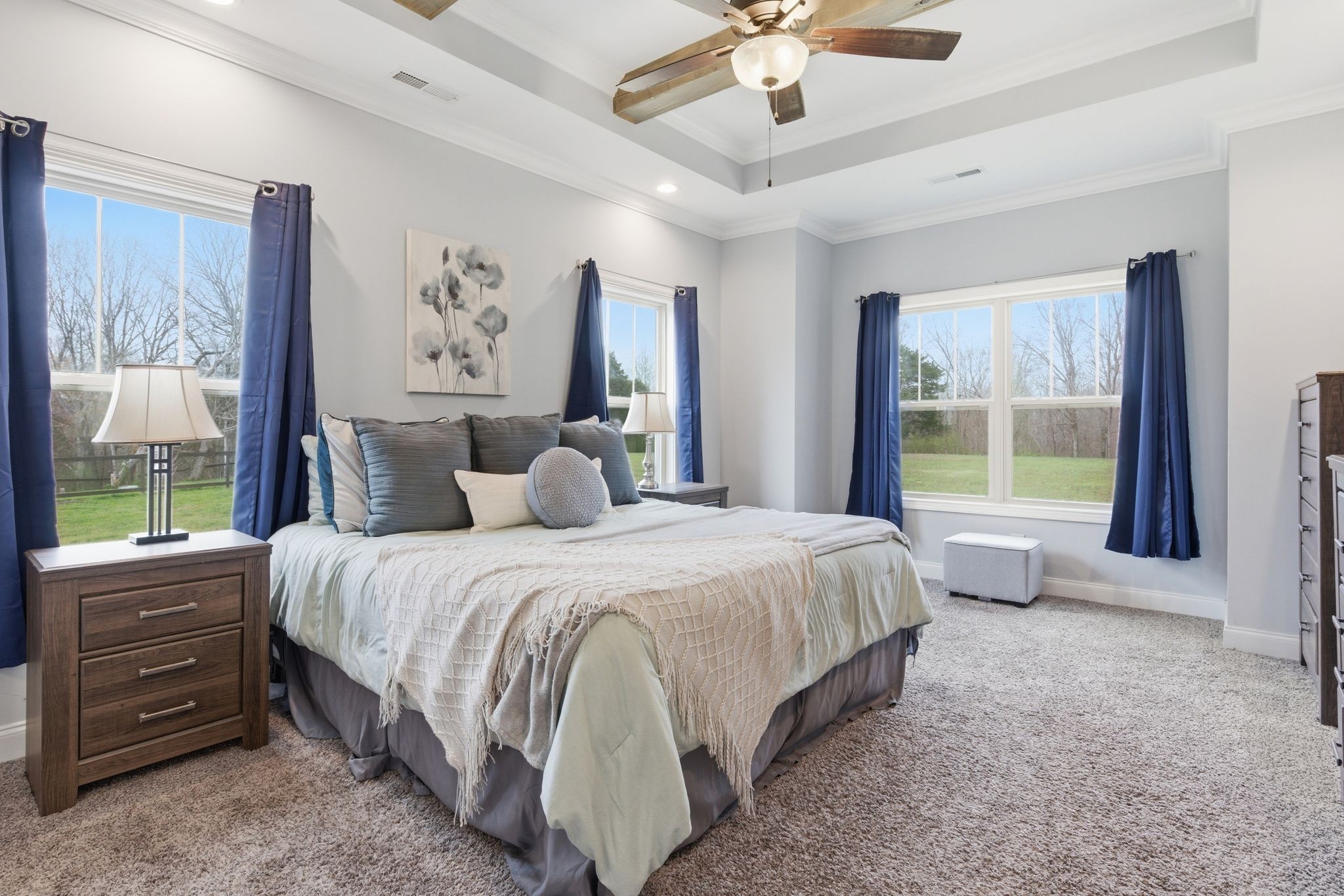 1166 Carney Winters Road Ashland City, TN 37015 - Photo 16 of 41 a bedroom with a large bed and a window