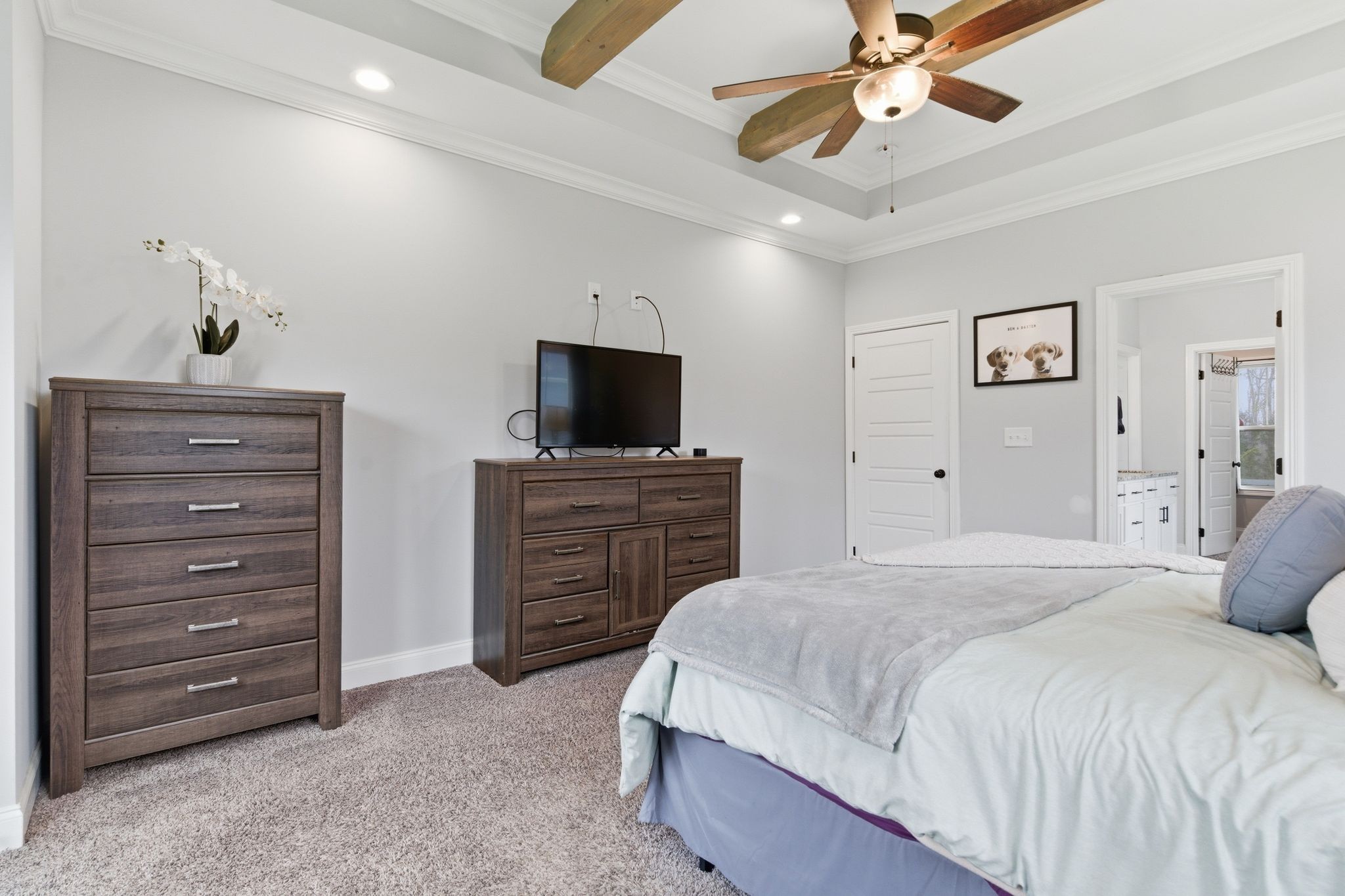 1166 Carney Winters Road Ashland City, TN 37015 - Photo 17 of 41 a bedroom with a bed and a flat screen tv