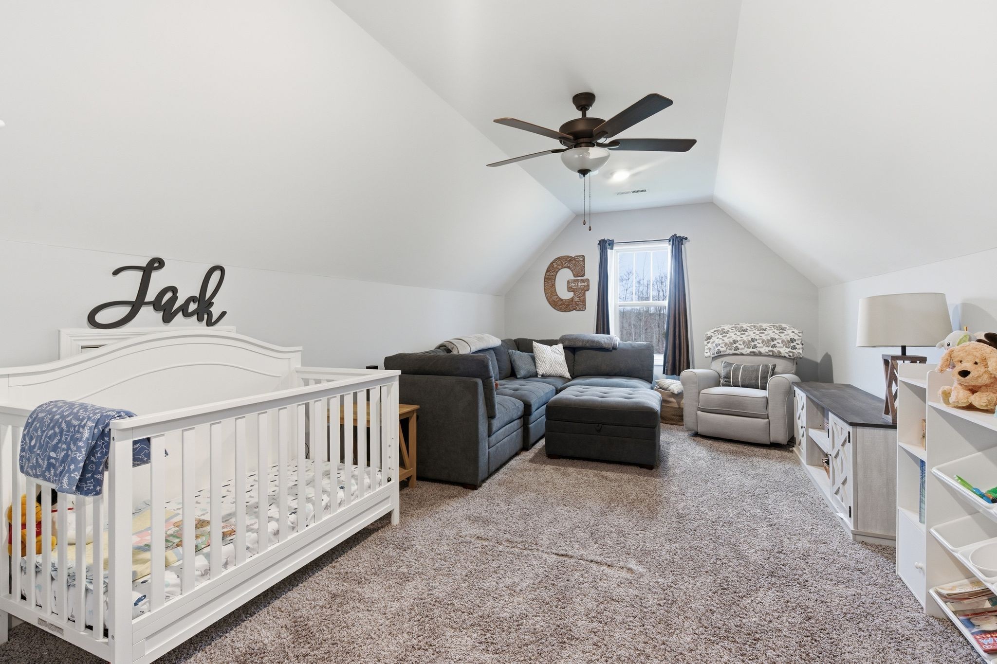 1166 Carney Winters Road Ashland City, TN 37015 - Photo 22 of 41 a living room with furniture and a chandelier
