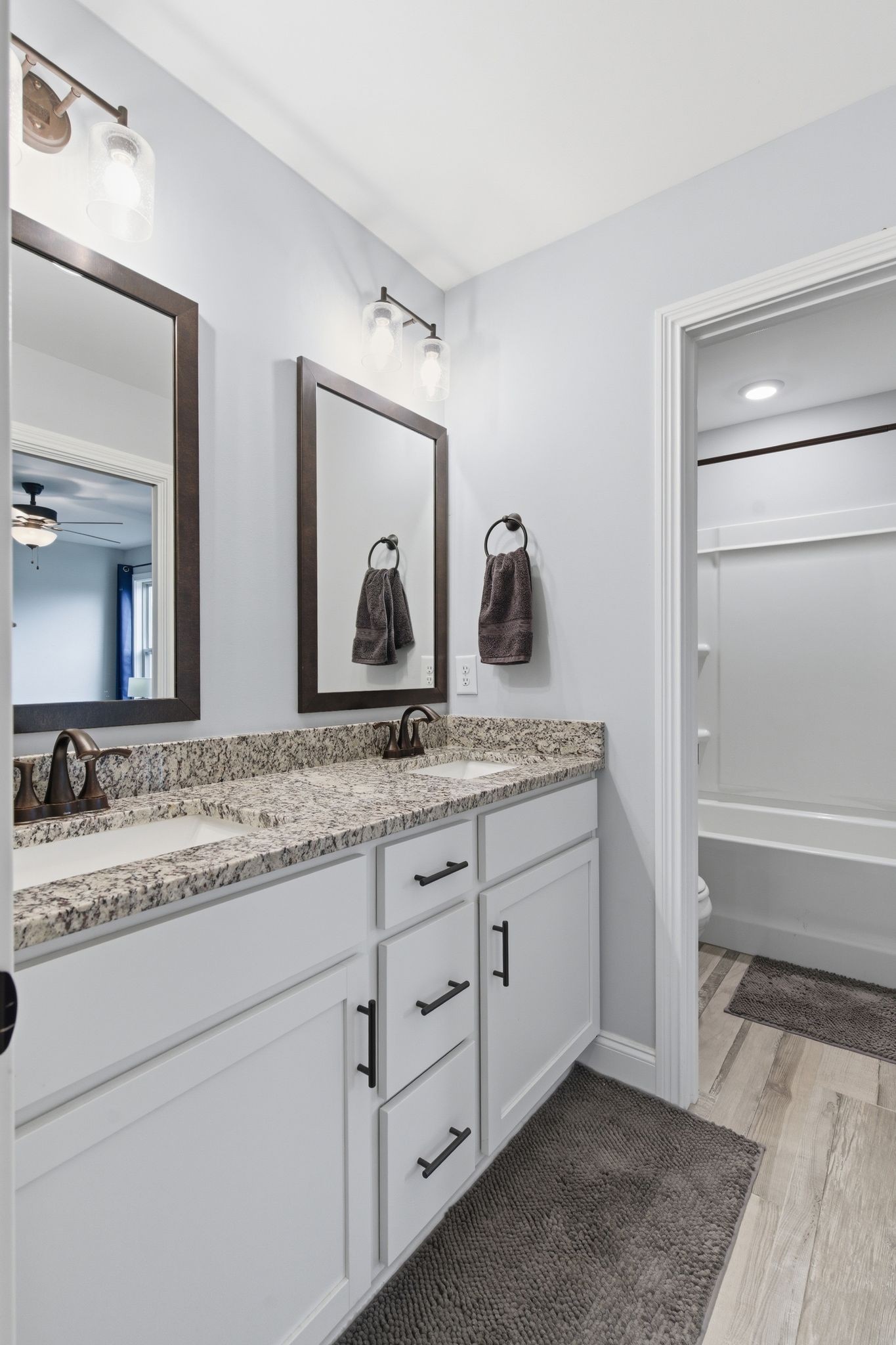 1166 Carney Winters Road Ashland City, TN 37015 - Photo 25 of 41 a bathroom with a granite countertop sink and mirror