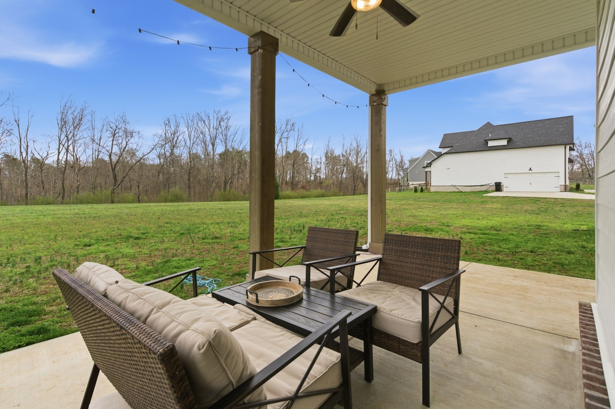 1166 Carney Winters Road Ashland City, TN 37015 - Photo 29 of 41 a view of a patio with chairs and table