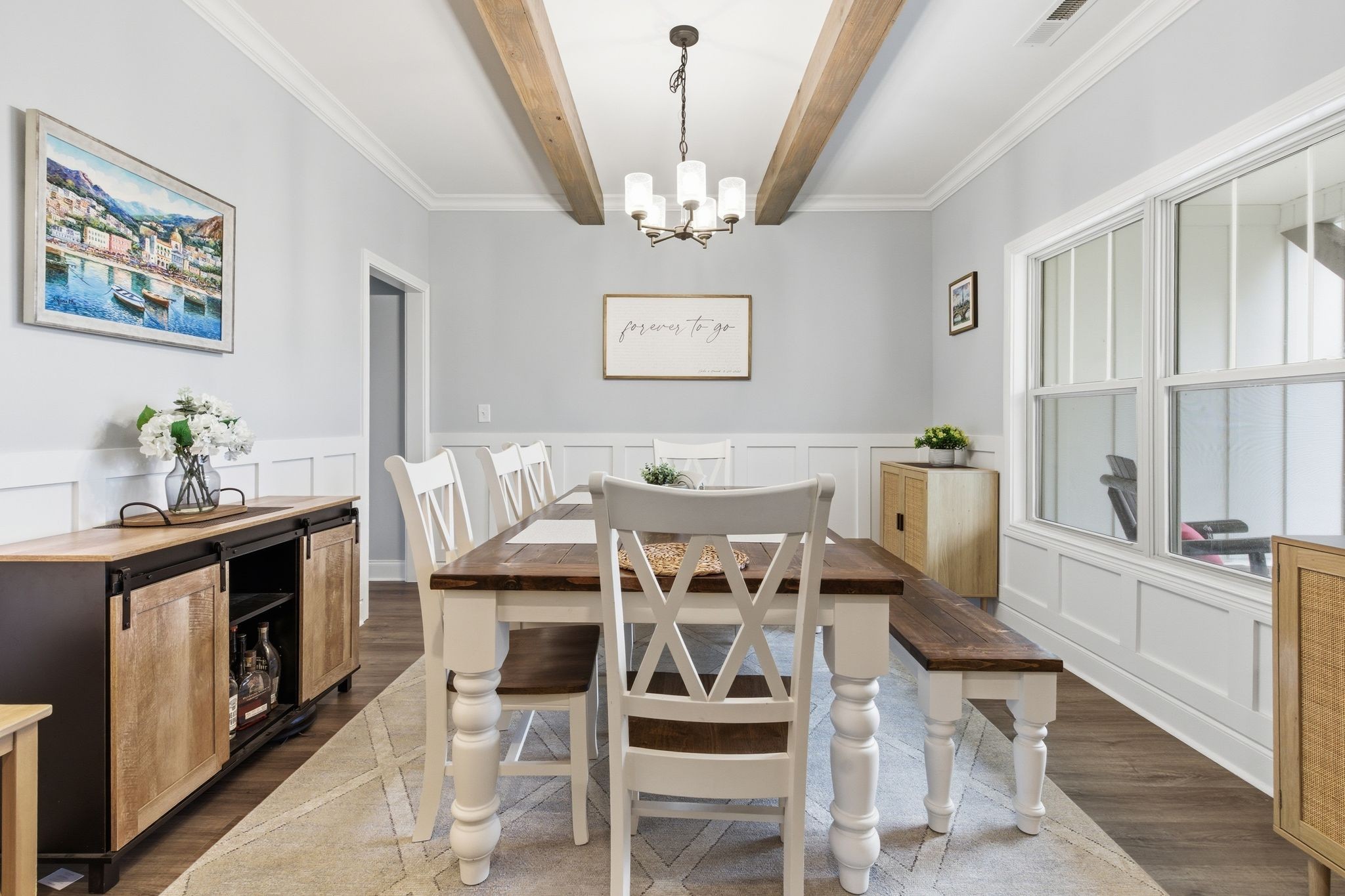 1166 Carney Winters Road Ashland City, TN 37015 - Photo 6 of 41 a view of a dining room with furniture wooden floor and a chandelier