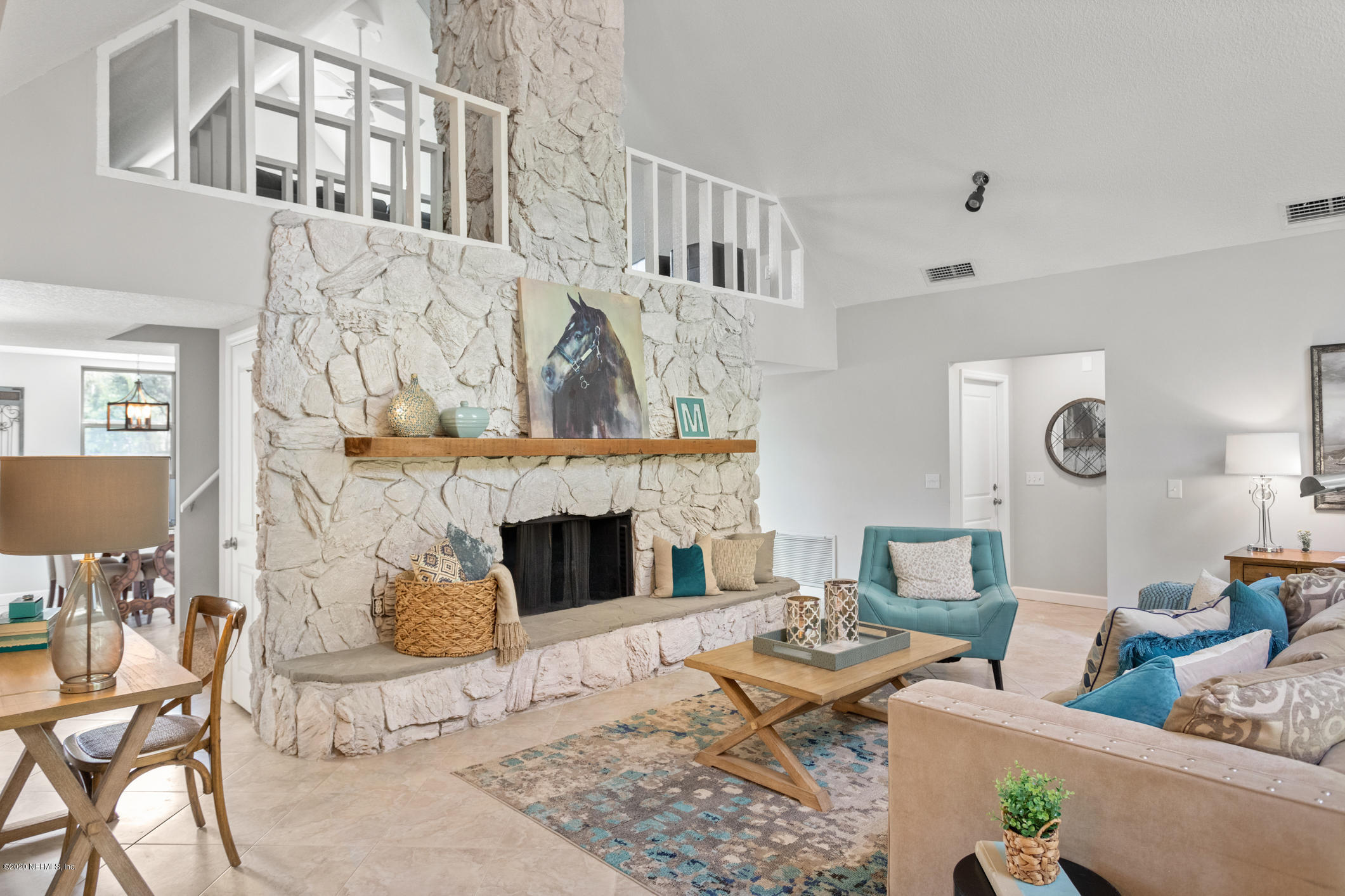 1427 Satsuma Road St. Johns, FL 32259 - Photo 12 of 59 a living room with furniture and a fireplace