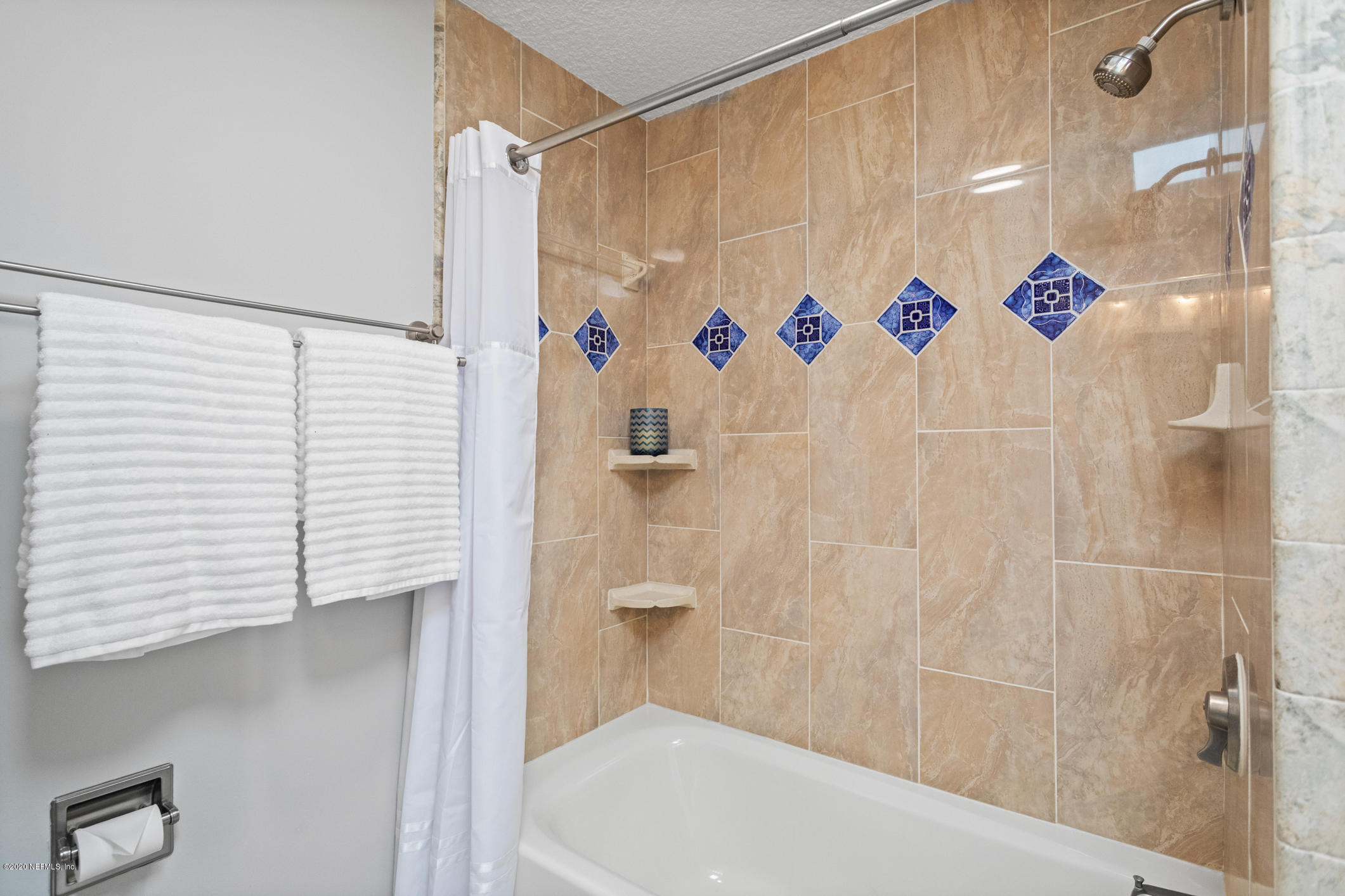 1427 Satsuma Road St. Johns, FL 32259 - Photo 41 of 59 a bathroom with a white shower curtain