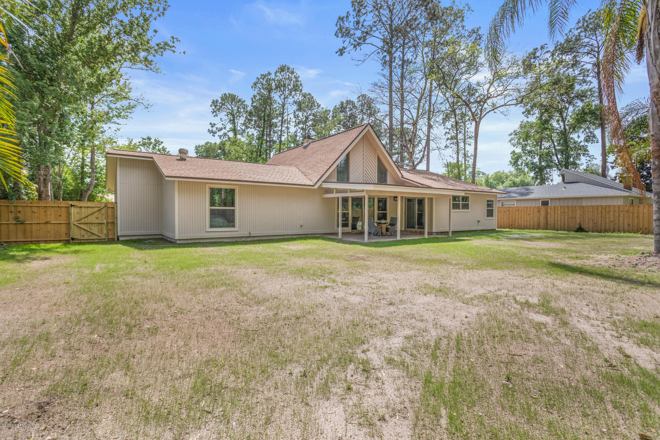 1427 Satsuma Road St. Johns, FL 32259 - Photo 58 of 59 a view of a house with a yard