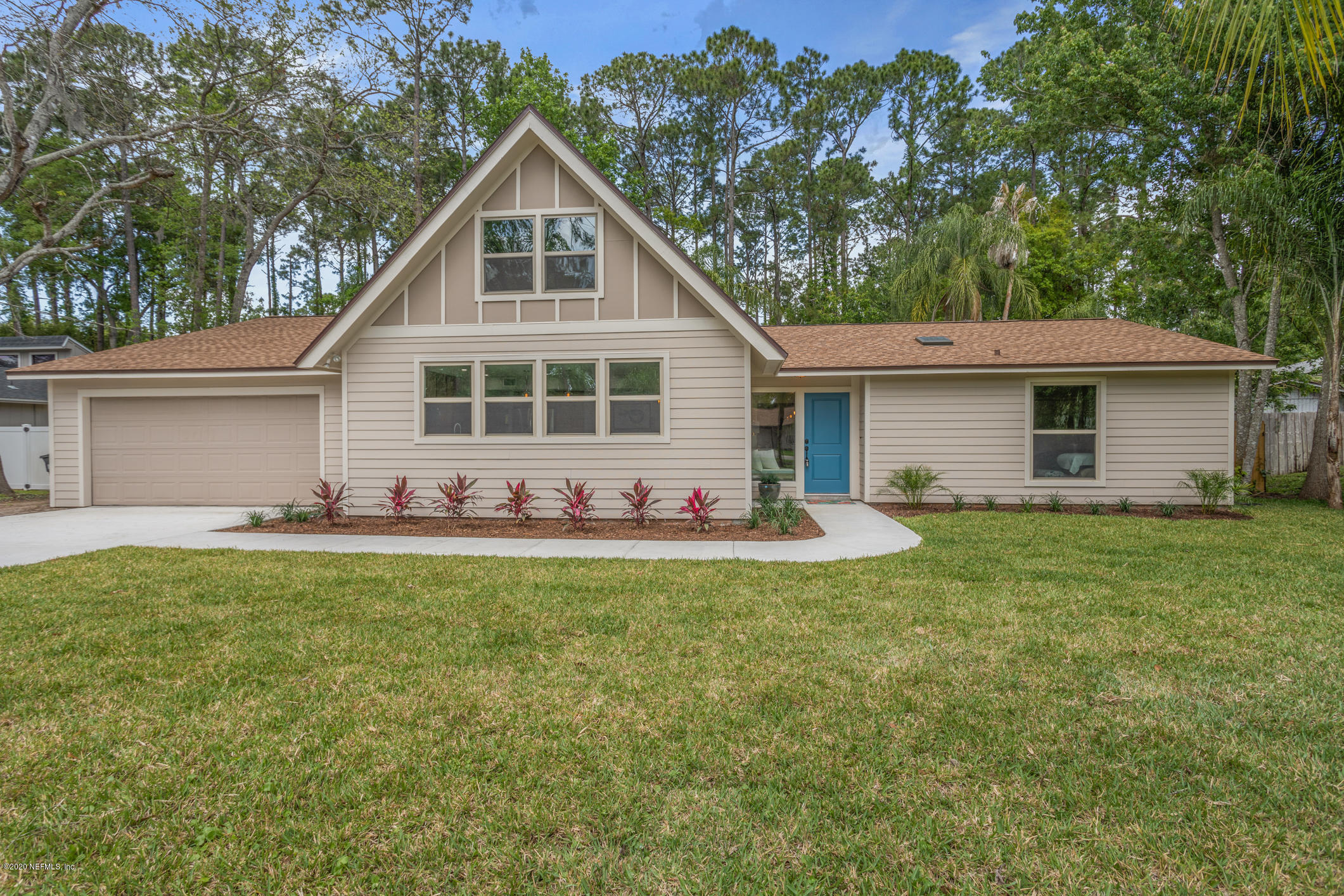 1427 Satsuma Road St. Johns, FL 32259 - Photo 6 of 59 a front view of house with yard and green space