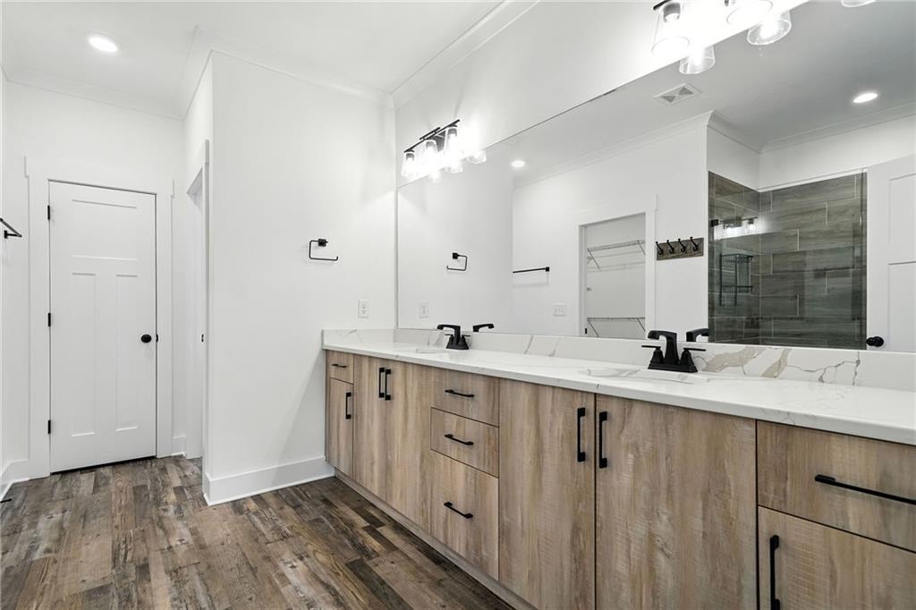 548 Stoneledge Road Jasper, GA 30143 - Photo 20 of 46 a spacious bathroom with double vanity and mirrors