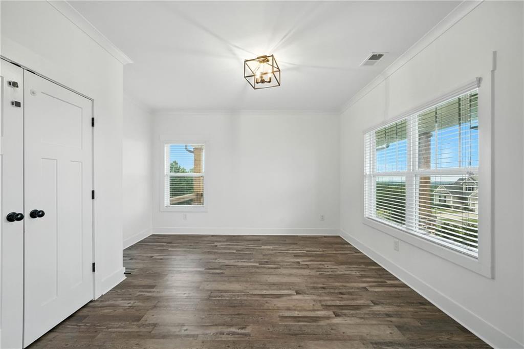 548 Stoneledge Road Jasper, GA 30143 - Photo 24 of 46 a view of an empty room with a window