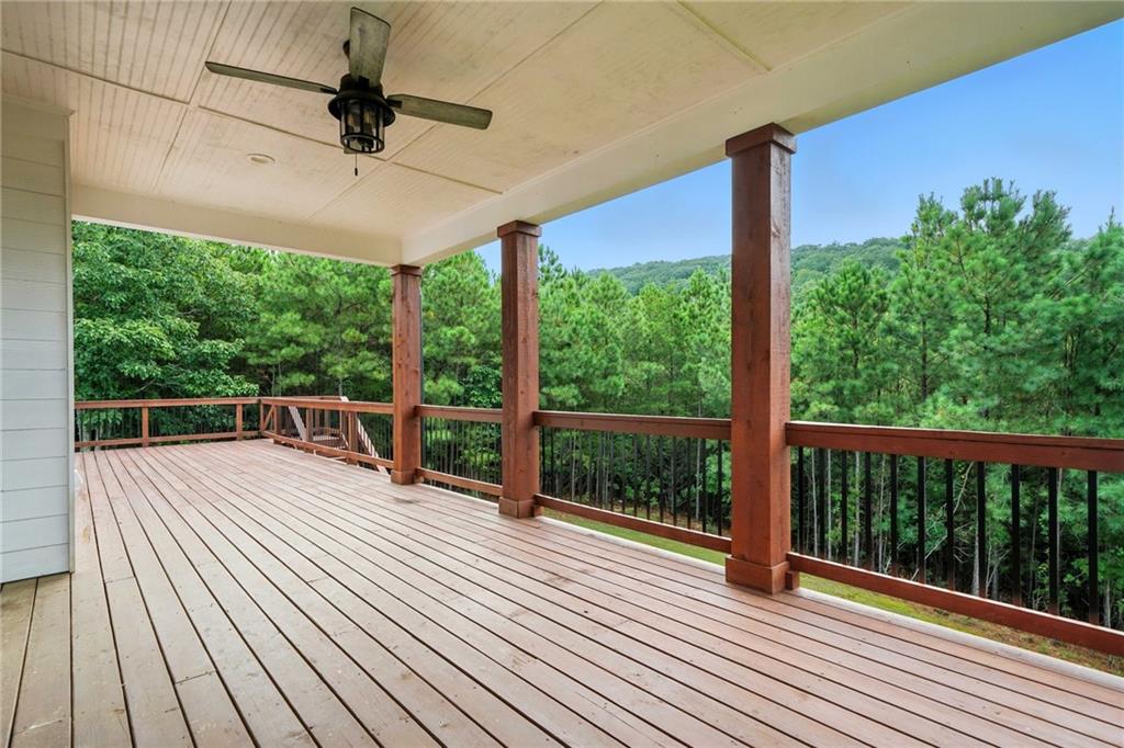 548 Stoneledge Road Jasper, GA 30143 - Photo 26 of 46 a view of balcony with wooden floor and outdoor space