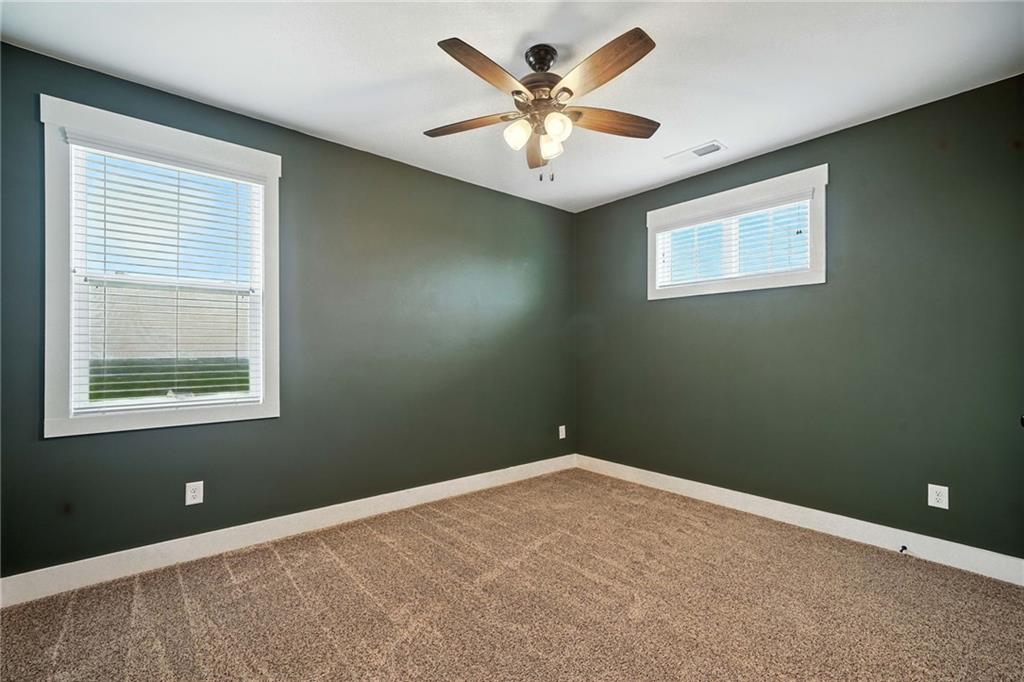 548 Stoneledge Road Jasper, GA 30143 - Photo 34 of 46 an empty room with a window