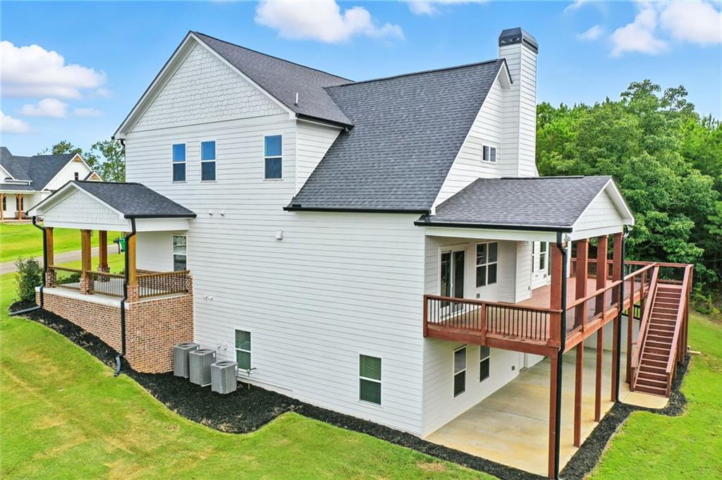 548 Stoneledge Road Jasper, GA 30143 - Photo 41 of 46 a view of a house with backyard and porch