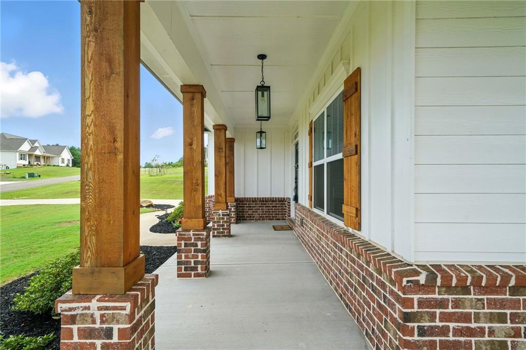 548 Stoneledge Road Jasper, GA 30143 - Photo 6 of 46 a view of a balcony with yard