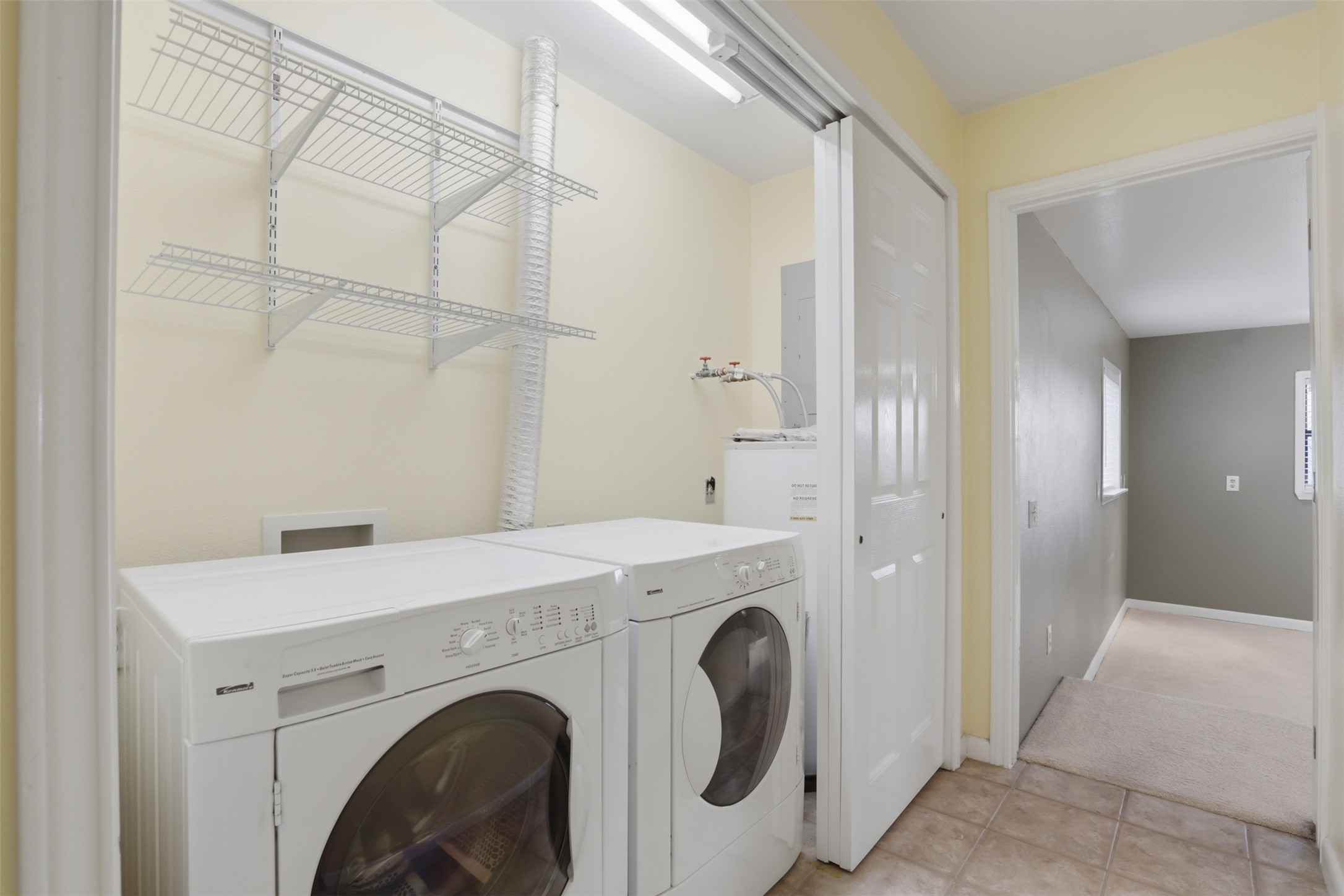 27600 Ranch To Market 1431 Marble Falls, TX 78654 - Photo 23 of 33 Laundry Closet with Overhead Storage and Full Lenth Closeable Comparment for Tidy Look in between use