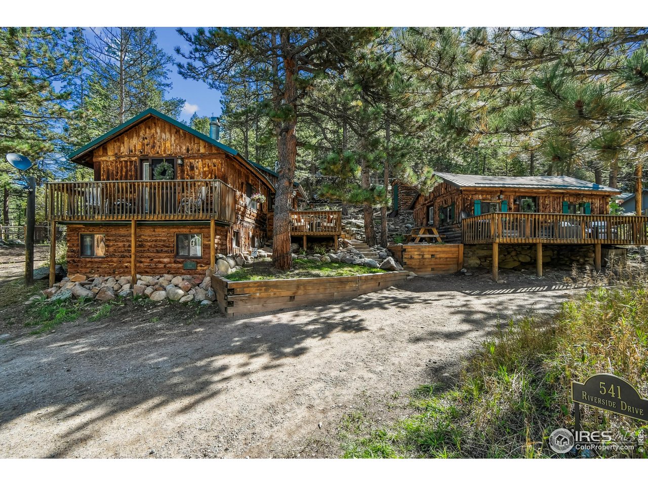 541 Riverside Drive Lyons, CO 80540 - Photo 2 of 45 a view of a house next to a yard