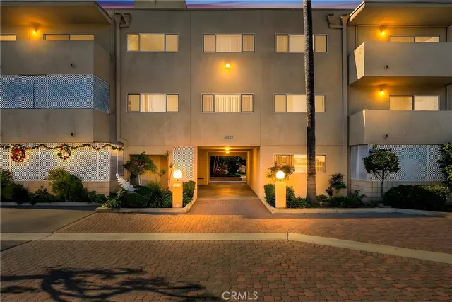 a view of a building with a street