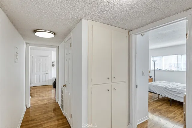 a view of a bedroom from a hallway