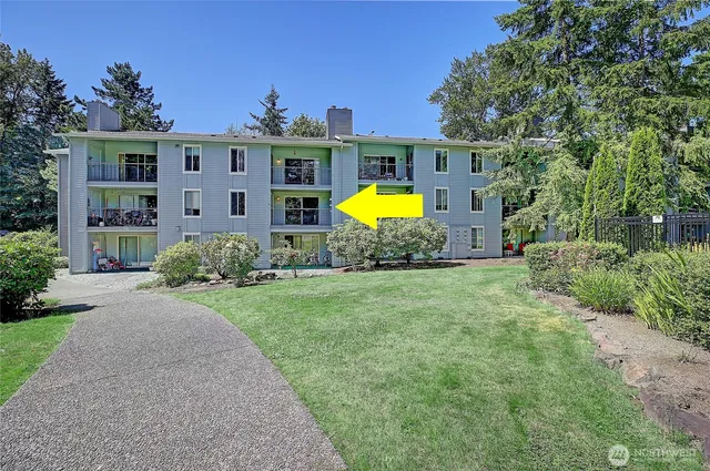a view of a house with a swimming pool