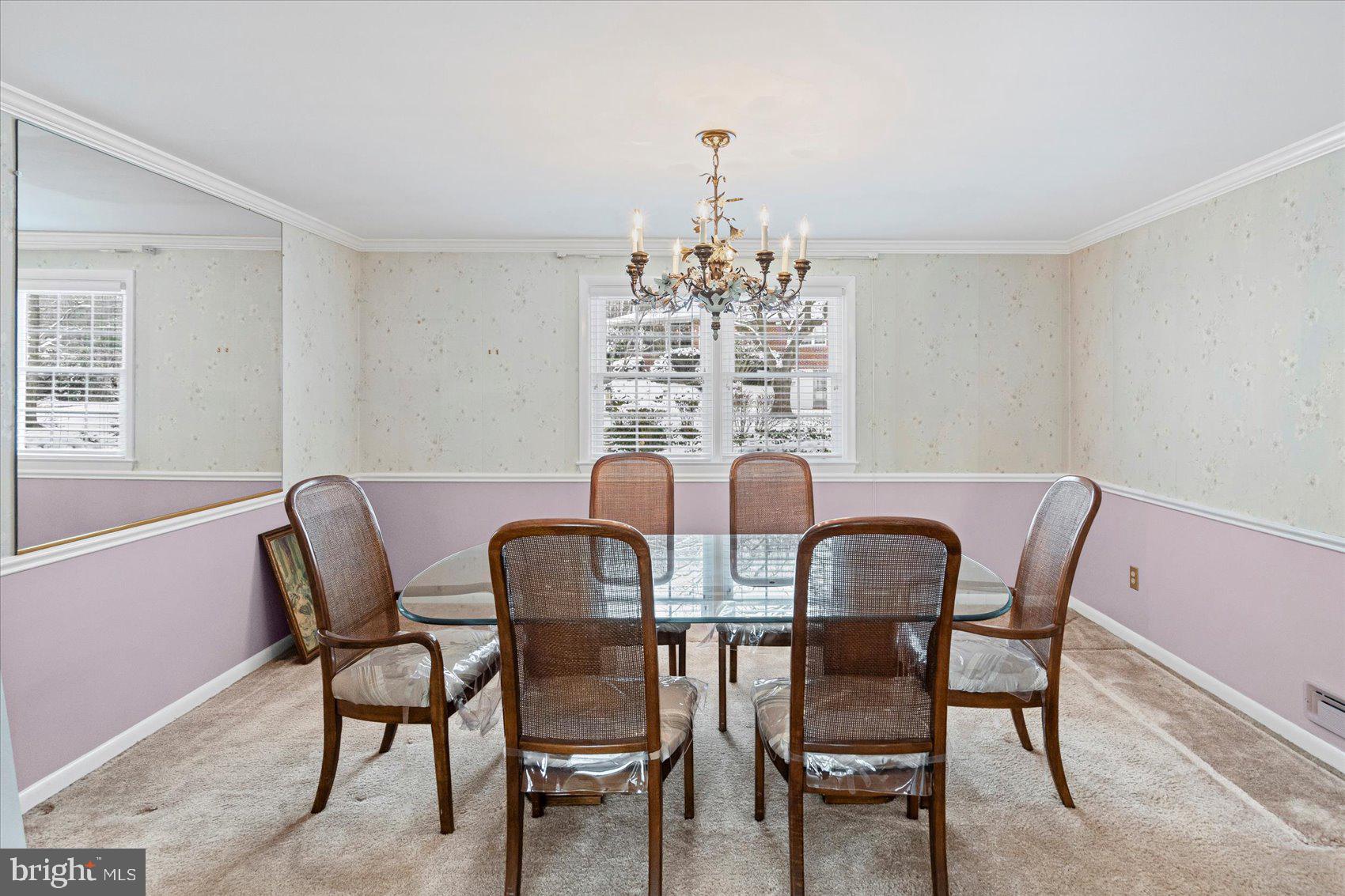 1004 Dunblane Road Baltimore, MD 21286 - Photo 12 of 60 a view of a dining room with furniture and chandelier