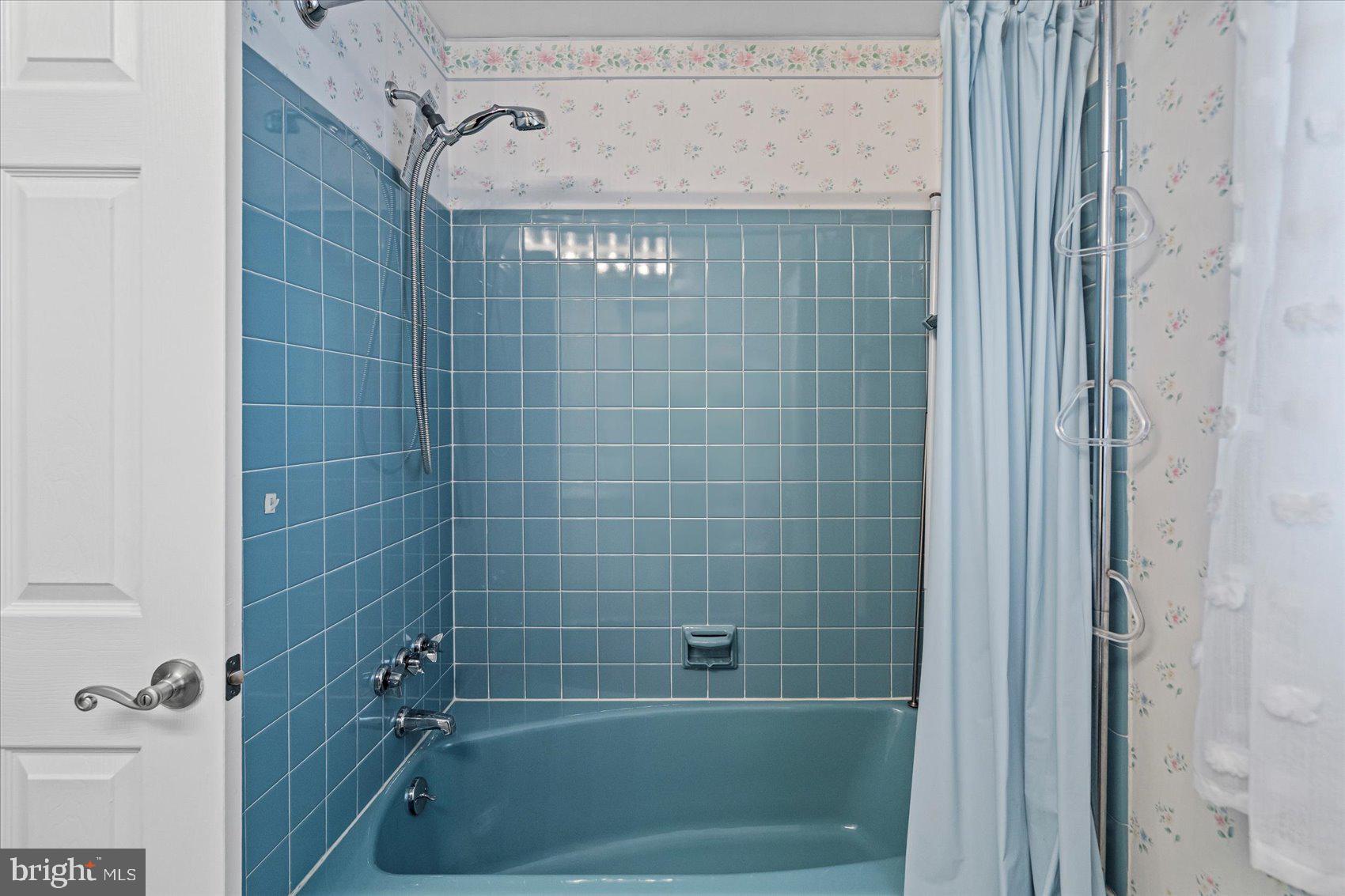 1004 Dunblane Road Baltimore, MD 21286 - Photo 35 of 60 a bathroom with a shower and a bathtub