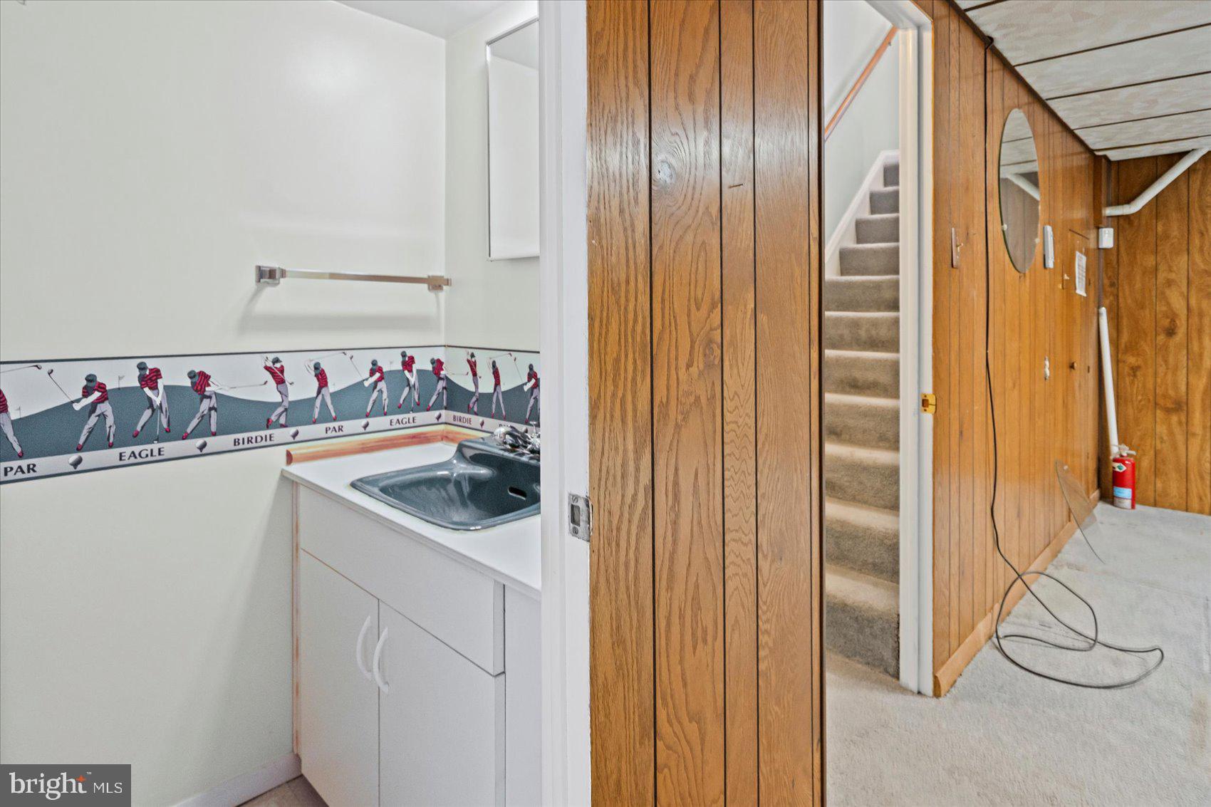 1004 Dunblane Road Baltimore, MD 21286 - Photo 41 of 60 a kitchen with a sink and a refrigerator