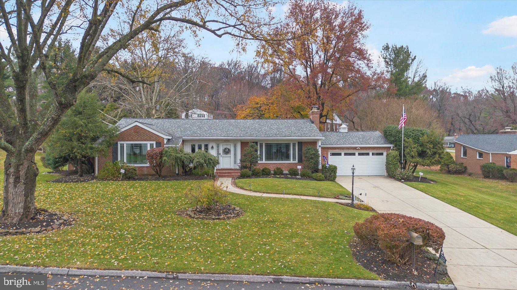 1004 Dunblane Road Baltimore, MD 21286 - Photo 50 of 60 a front view of a house with garden