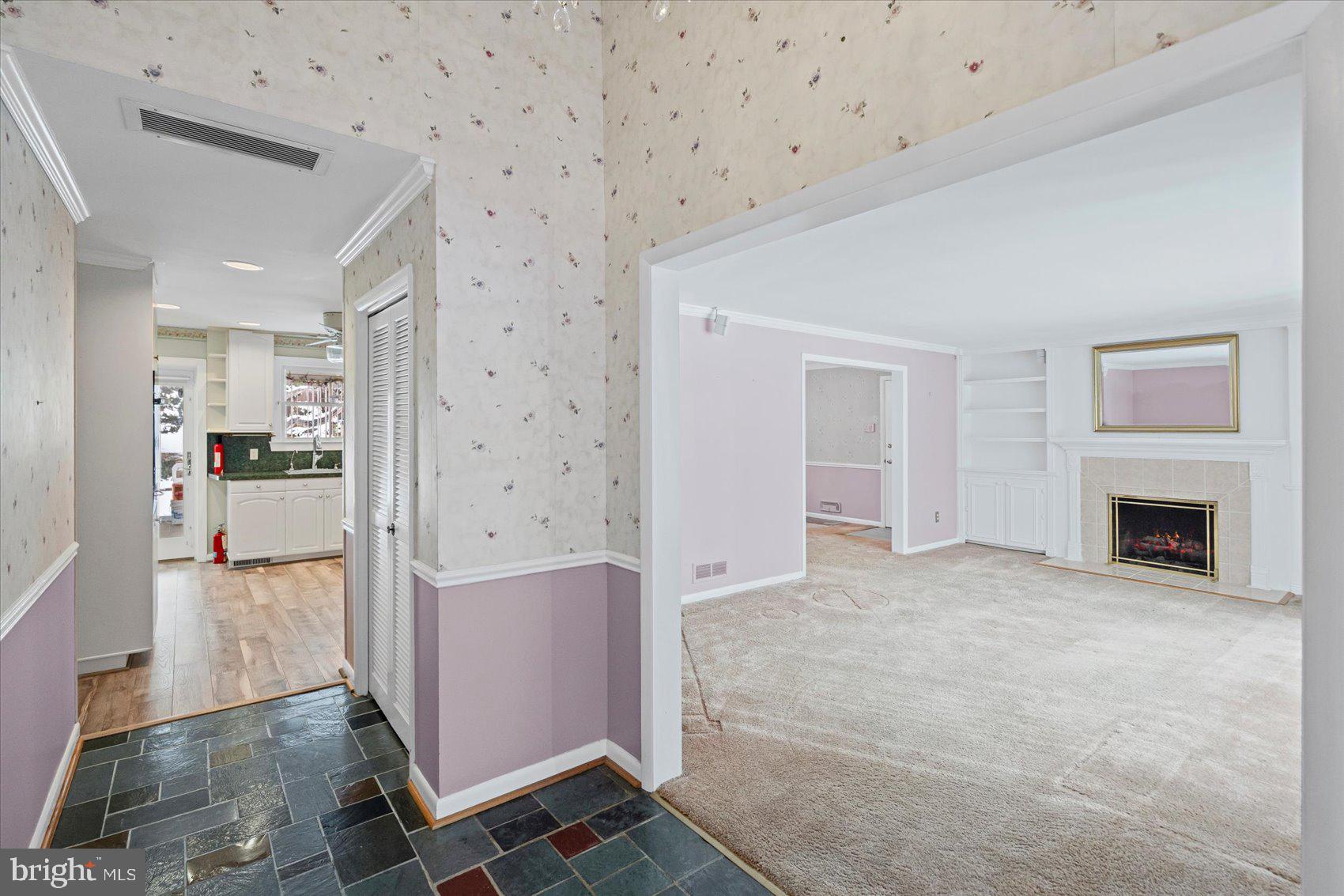 1004 Dunblane Road Baltimore, MD 21286 - Photo 6 of 60 a view of a kitchen with furniture and a fireplace