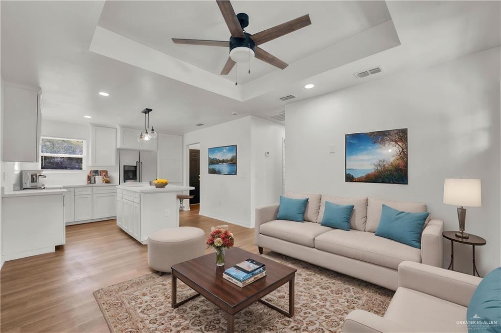 670 West Durham Avenue Raymondville, TX 78580 - Photo 13 of 13 a living room with furniture and kitchen view