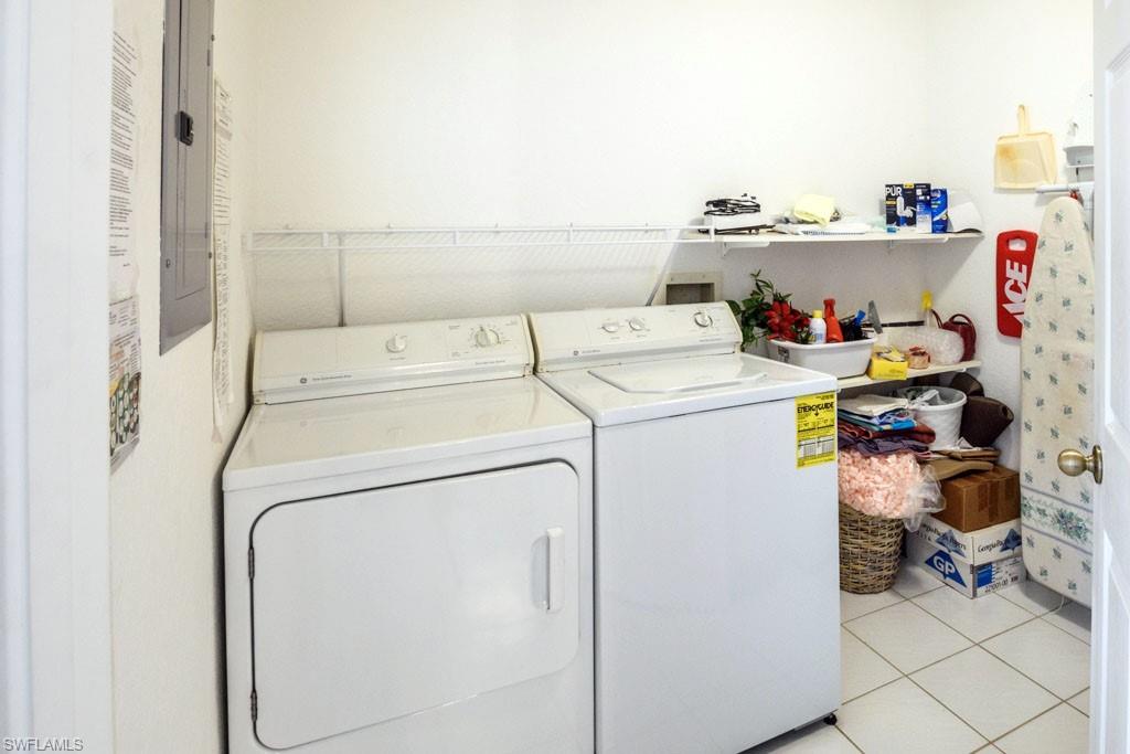 448 Gabriel Circle, Unit 3302 Naples, FL 34104 - Photo 20 of 32 a utility room with dryer and washer