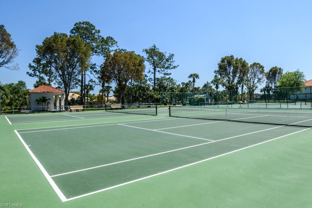 448 Gabriel Circle, Unit 3302 Naples, FL 34104 - Photo 30 of 32 a view of a tennis court