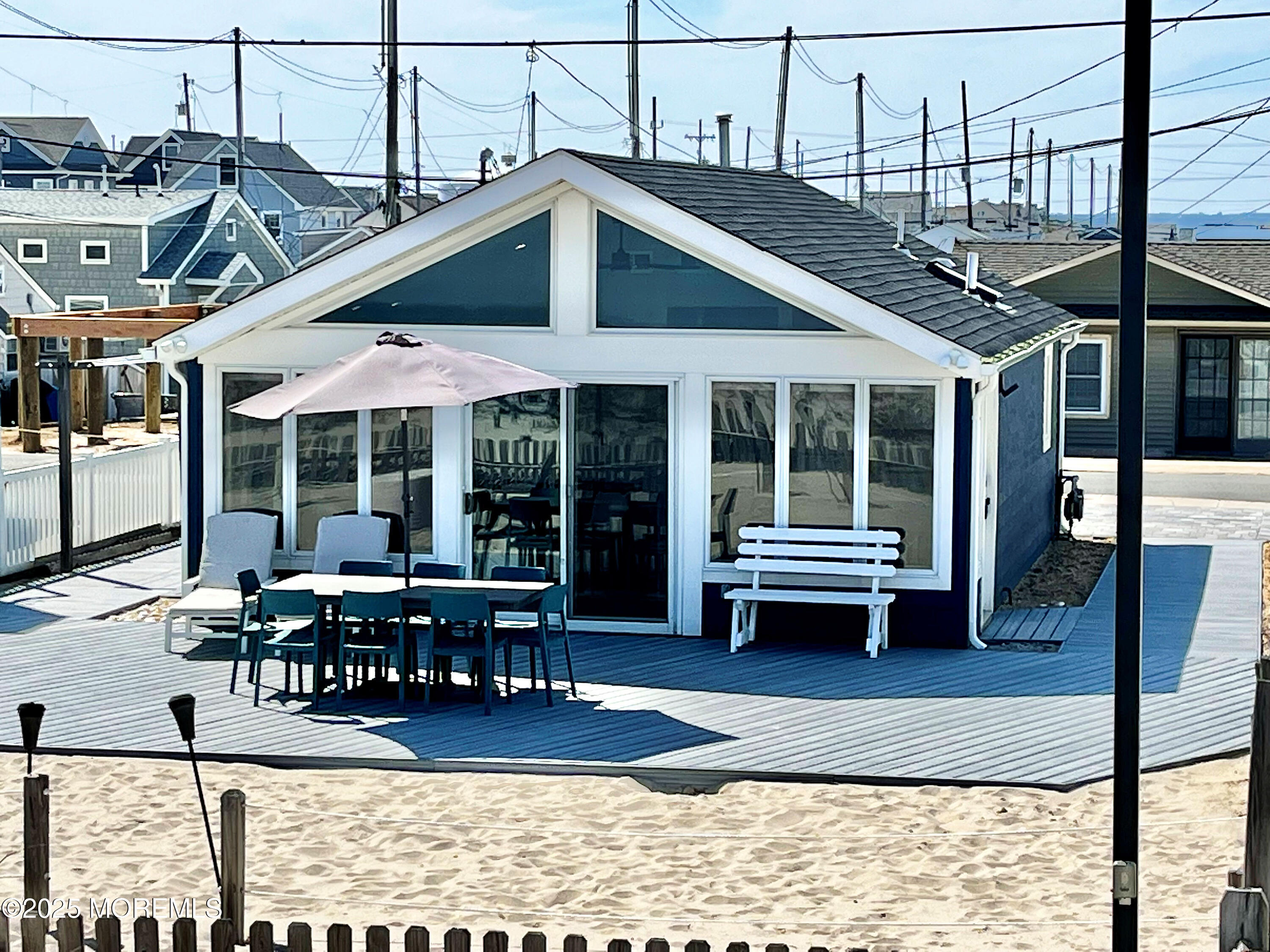 3170 Ocean Road Lavallette, NJ 08735 - Photo 13 of 13 a view of a dinning table and chairs in the patio