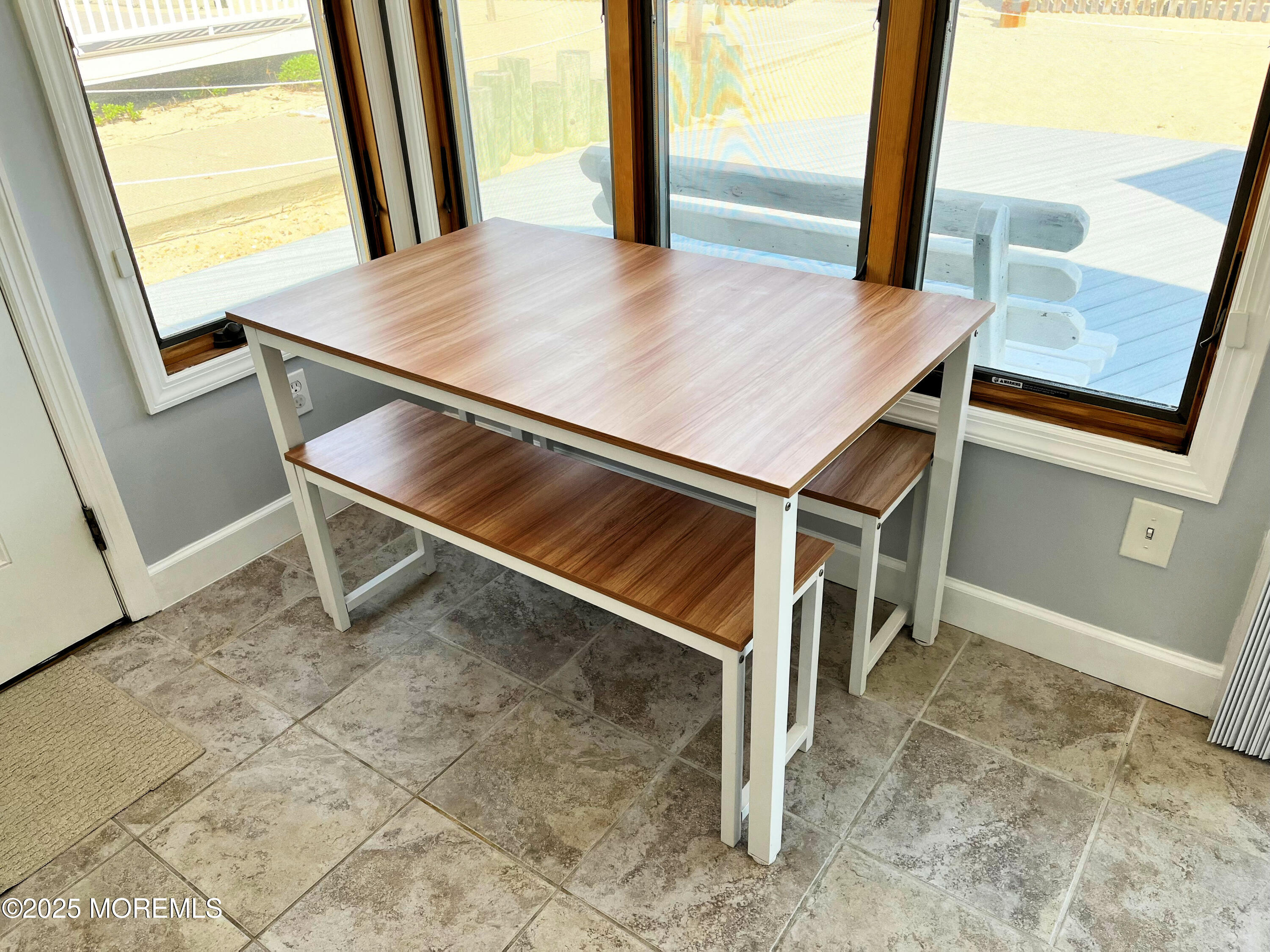 3170 Ocean Road Lavallette, NJ 08735 - Photo 6 of 13 a balcony with table and chairs