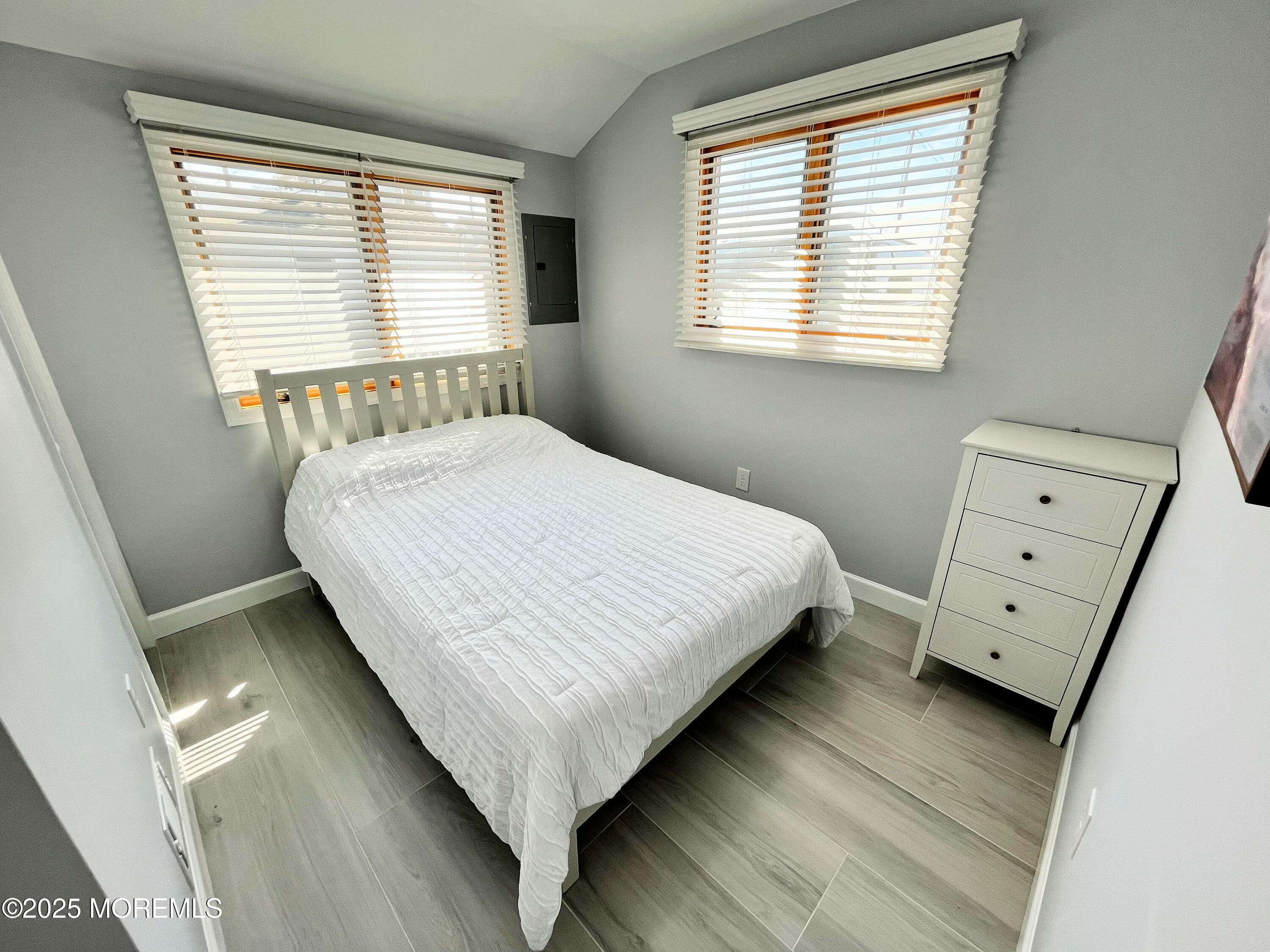 3170 Ocean Road Lavallette, NJ 08735 - Photo 8 of 13 a bedroom with a bed and a window
