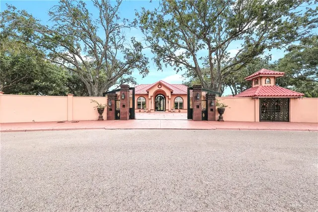 a house with trees in front of it