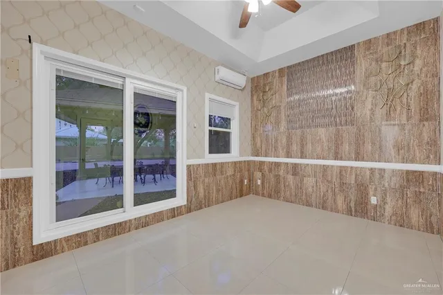 a view of outdoor space with sliding door and wooden floor