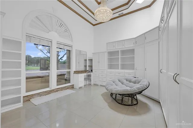 a view of a livingroom with furniture and windows