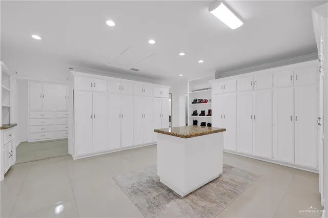a view of a kitchen with electric appliances