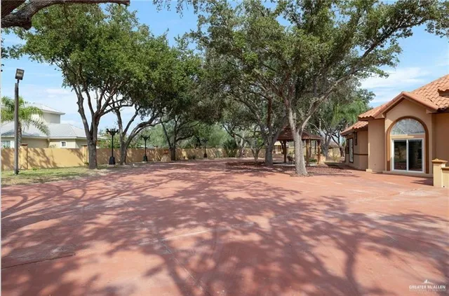 a view of outdoor space with deck and tree