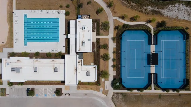 a bathroom with a tub and a sink