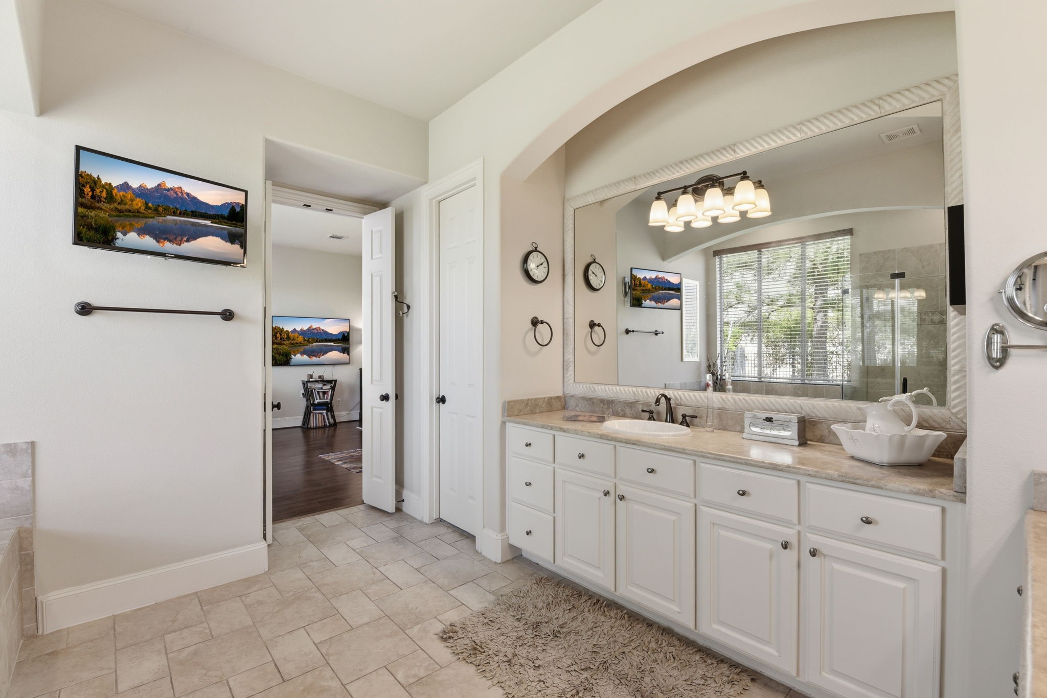 223 South Bauer Point Circle Spring, TX 77389 - Photo 22 of 50 a bathroom with a double vanity sink and a mirror
