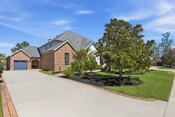 a house view with a garden space