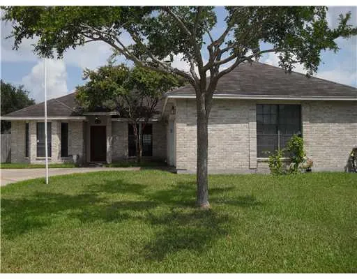 a house view with a garden space
