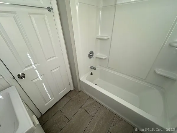 a bathroom with a bathtub